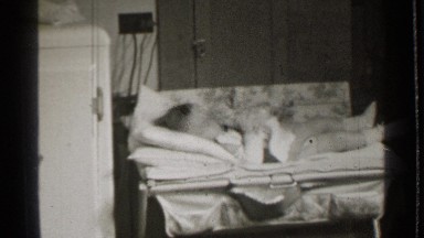 1939: small baby sleeping in bed DANIELSON CONNECTICUT