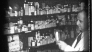 1939: the doctor in a laboratory, preparing the dosage to diagnose the sick
