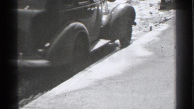 1939: sidewalk with person walking down it DANIELSON CONNECTICUT