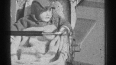 1939: kid sleep with her comfortable chair in her home DANIELSON CONNECTICUT