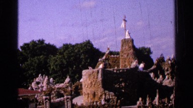 1965: People Exploring a Pirate Cove with a White Flag
