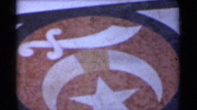 1944: A Plate Arranged with Symbolic Red Background, White Star, and Moon