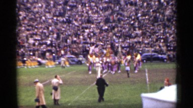 1944: parade in starting ceremony of an game event in football ground with music