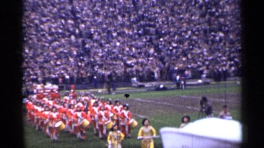 1944: Red Marching Band Crosses Football Field San Francisco California