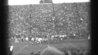 1944: sports people are playing at the ground more crowd watching the sport