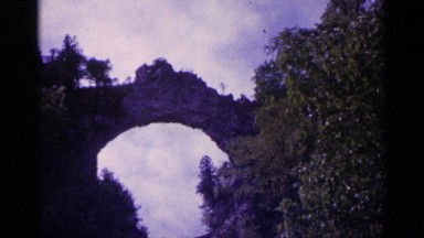 1960: Natural Stone Bridge Stretches to Form an Arc