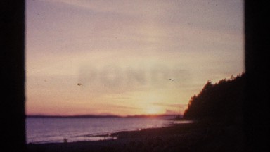 1960: sunset over the water. MICHIGAN