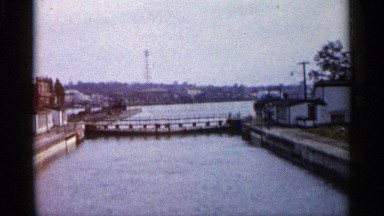 1960: zoom in on a bridge over water. MICHIGAN