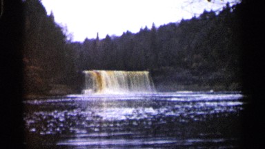 1960: a beautiful falls in the forest looking beauty of the nature with a trip