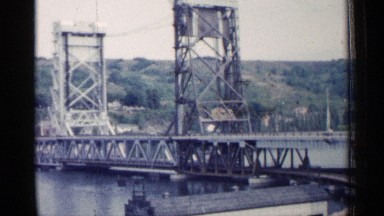 1960: the big river run that place center go to big bridge in steel near to road