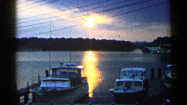 1960: the climate are boat with less sun rising of the pool side. MICHIGAN