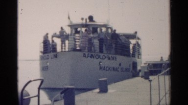 1960: people enjoying a boat ride. MICHIGAN