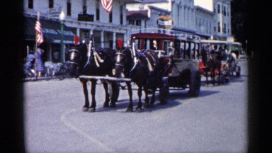 1960: Horse-Drawn Carriages Standing on a Michigan Street