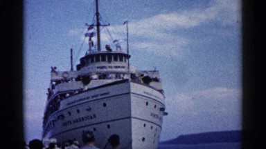1960: a large size ship that does not moving and flags also available the name
