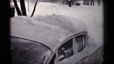 1961: old car covered in snow MINNESOTA