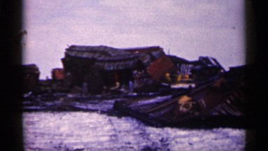 1961: in many hut are broken in earthquake and to ready to live a people hut