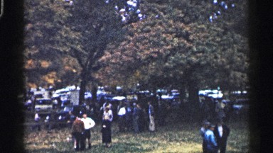 1961: People Gathered at Park Talking Minnesota
