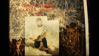 1961: a man still in picture year month date letter in red color