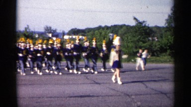 1961: a marching band parading down the street in full regalia MINNESOTA