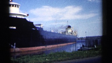 1961: a huge shipyard on a roadside, cars are traveling MINNESOTA