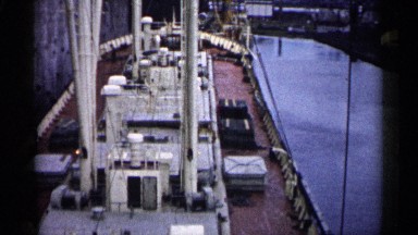 1961: external footage of the deck of a large ship in a port. MINNESOTA