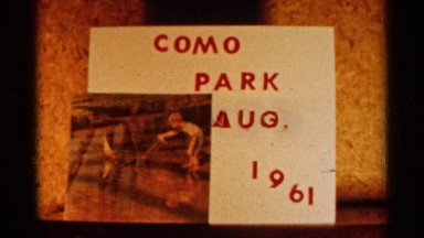 1961: name board to park open date mention next to view of the park
