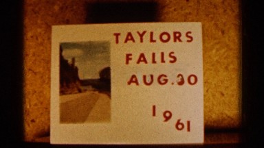1961: a screen with a board and some letters and mentioned the year