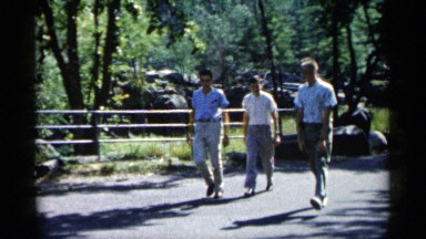 1961: father taking a walk in early morning with his lovely sons
