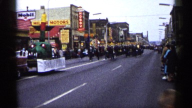 Army Parade Marching on Road with Onlookers in Minnesota