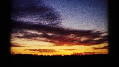 1961: clouds silhouetted against a colorful horizon MINNESOTA