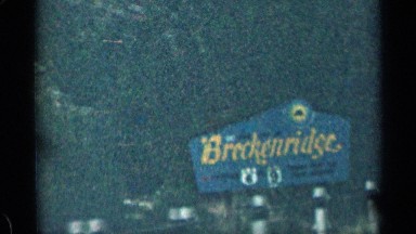 1963: cafe, shop, hotel, motel banner signs from a vehicle running on a highway