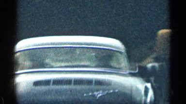1963: vehicles and dog drive through mountainous regions. COLORADO