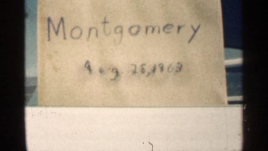 1963: a information board that represent a name and a date at a white color