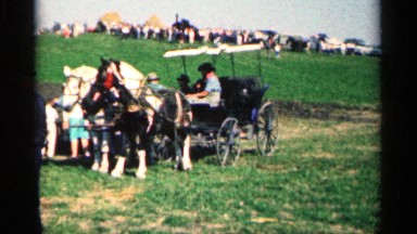 1963: the person sitting on the horse cart in their village MONTGOMERY MINNESOTA