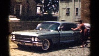 1963: parking car to near women open the door front side