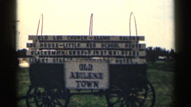 1963: a board at the transport backside and it represent old abilene town
