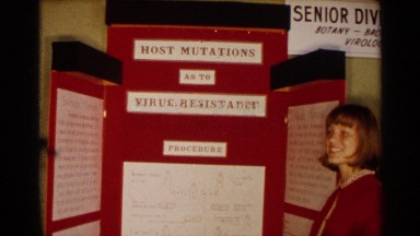 1963: a teenage girl student explaining about her project in a science