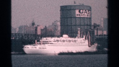 1964: a view of a gas filling station nearby the seashore,looking very amazing
