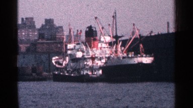 1964: large ocean liner in a port on a sunny day. NEW YORK CITY