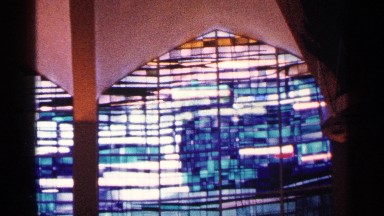 1964: a wood and cloth lamp to next view big round shape building attach pillar