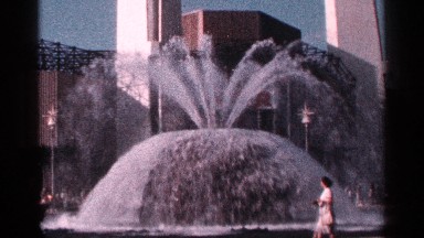 1964: a fountain that looks cute to flow the water in front of a building