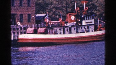 1964: stream boat moving on a water making large wave in sides