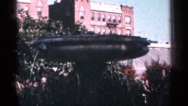 1964: People Moving in Front of Building, Pedestrians Walking