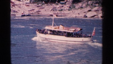 1964: boat with passengers traveling through the river NIAGRA FALLS CANADA