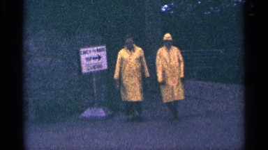 1964: two people wearing raincoats on a walk NIAGRA FALLS CANADA