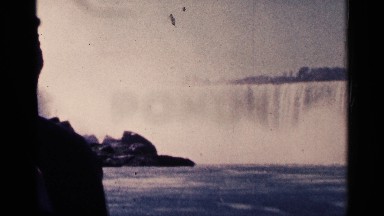 1964: the video is shown a beautiful water fall the man watching the water