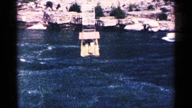 1964: a gondola moving above a rushing river NIAGRA FALLS CANADA