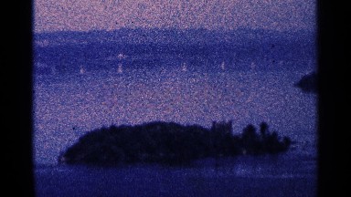 1964: the big river near to tree and grasses not view in sunshine is very light