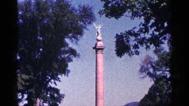 1964: statue high over the pillar and an equestrian statue monuments