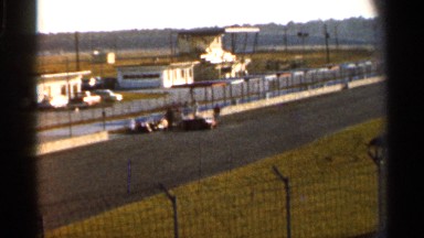 1966: at the race course road many peoples are standing and talking each other